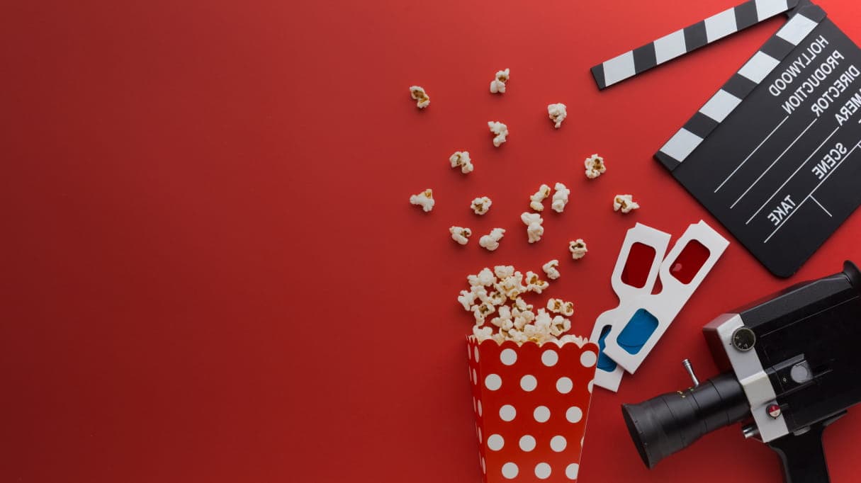 Movie popcorn, 3D glasses and camera